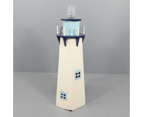 A scratch built light up model of a lighthouse. GWO. 40x124cm.Has not been PAT tested, but functions when turned on. 