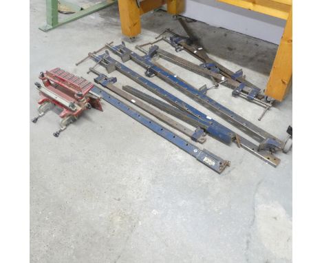 A quantity of sash clamps and a jig. 11pcs.  Longest 125cm. 