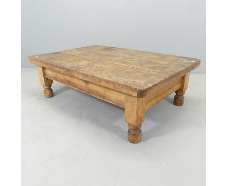 A vintage pine plank top coffee table. 104x34x72cm. 