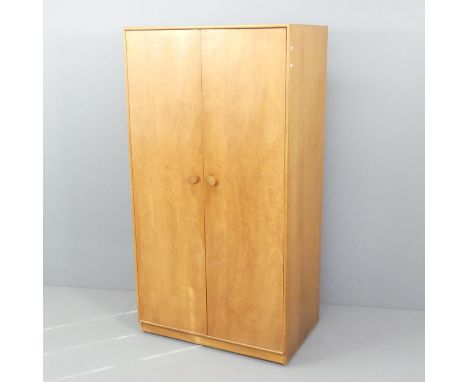 A mid-century Meredew light oak veneered two door wardrobe, with maker's label. 91x172x57cm. 