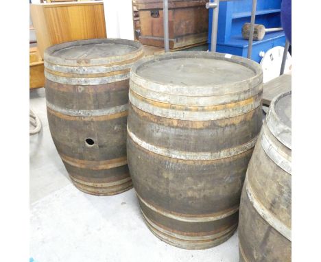 A pair of vintage coopered oak barrels, marked "Ramoneda". 78x101cm. 