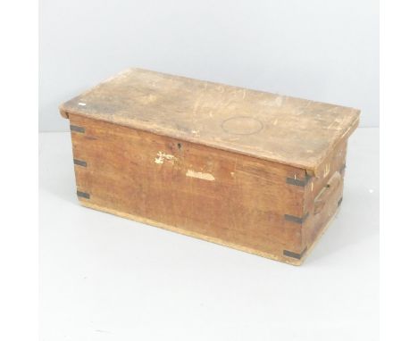 A vintage stained pine and metal bound chest. 89x37x43cm. 