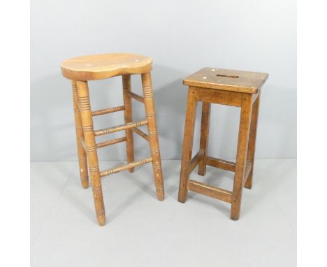 A vintage oak lab stool and a pine lab stool. Tallest 76cm. (2) 