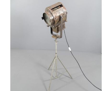 A.E CREMER - a vintage theatre spotlight on tripod stand.GWO, but seems very dim as if converted to use as a standard lamp. 