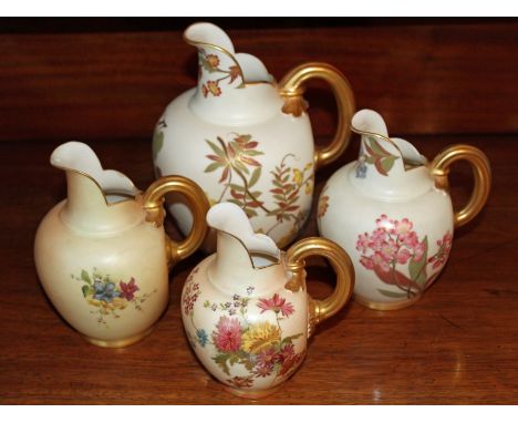 Royal Worcester blush ivory jug with painted floral decoration, 19cm high and three other smaller examples (4) 