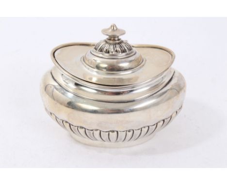 Edwardian silver tea caddy of oval form with half fluted body, (Sheffield 1903)