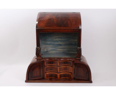 19th century Continental walnut table cabinet of architectural form, with arrangement of drawers and cupboards, 57cm