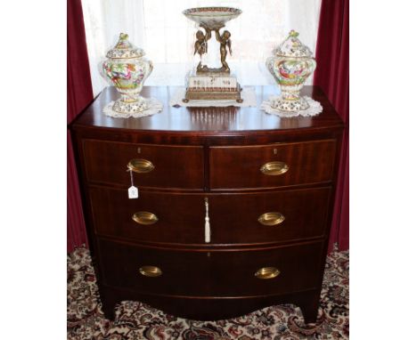 Regency mahogany bow front chest of two short and two long drawers, on bracket feet, 93cm wide 