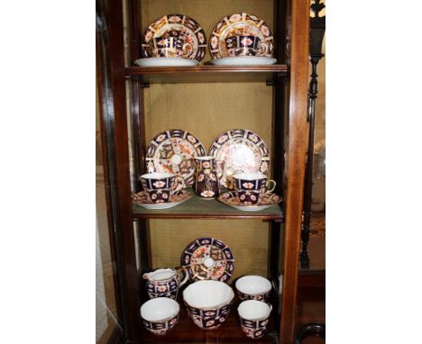 Part service of Royal Crown Derby Imari teawares to include three sugar bowls, two milk jugs, five cups and saucers and four 