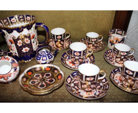 Group of six similar Royal Crown Derby Imari coffee cups and saucers, a large three-handled tyg, pair of pin dishes, miniatur