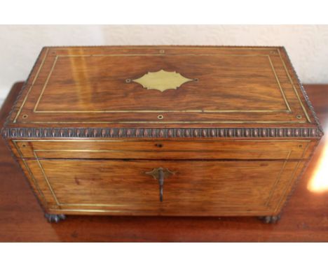 Regency rosewood and brass inlaid tea caddy with beaded borders and twin loop handles, fitted interior with twin lidded canis