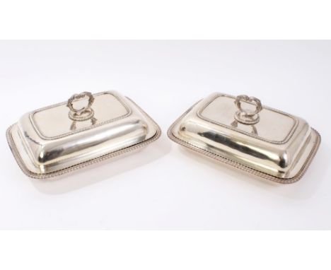 Pair of good George III silver entree dishes by Joseph Craddock & William K. Reid, of rectangular form with gadrooned borders