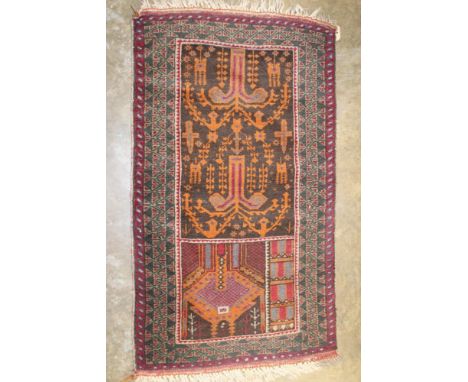 Eastern prayer mat, segmented field with stylised tree and architectural motifs in geometric borders
