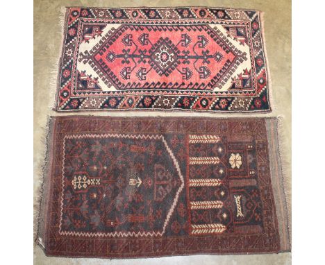 Antique Eastern prayer rug, the aubergine field with foliate mihrab and architectural ornament in geometric borders, 125cm x 
