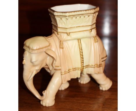 Late Victorian Royal Worcester blush ivory spill vase in the form of an elephant, date code for 1898, 15cm high 