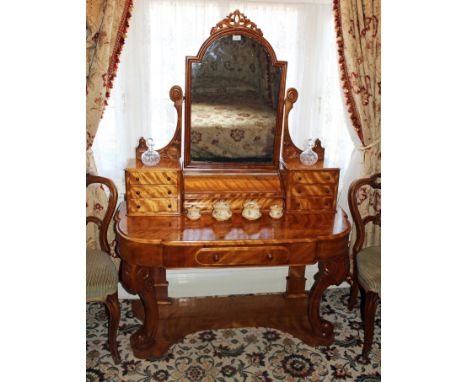 Victorian satinwood duchess dressing table, the super-structure with arched swing mirror and cushion compartment flanked by s