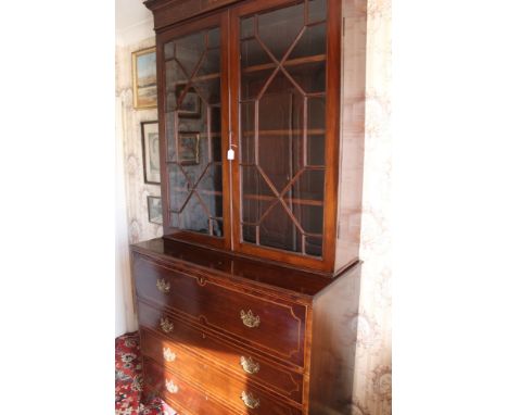 George III mahogany and inlaid secretaire bookcase, possibly associated top with dentil cornice and inlaid tablet frieze, enc