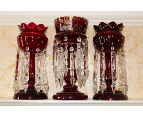 Pair of Victorian cranberry glass lustres with applied white enamel ornament, 36cm high, together with a fine quality Victori