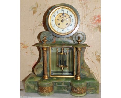  Early twentieth century French green onyx mantel clock of architectural form with exposed escapement and mercury pendulum, 3