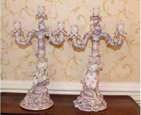 Pair of Dresden-style figural three branch candelabra with foliate scrolling ornament, 50cm high  CONDITION REPORT Small chip