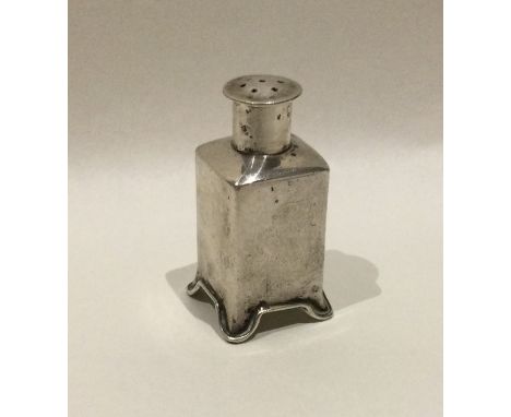 A Chinese silver pepper of cylindrical form on bracket feet. Marked to base. Approx. 29 grams. Est. £30 - £50.