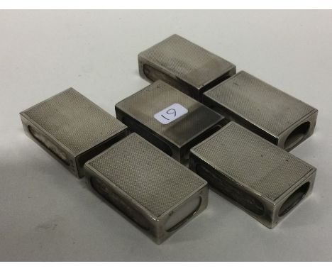 A good set of six silver and engine turned matchbox holders. London 1971. By Asprey &amp; Co. Approx. 106 grams. Est. £100 - 