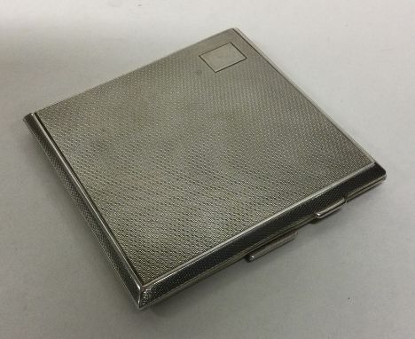 CHESTER: An Art Deco engine turned silver cigarette box. By T&amp;S. Approx. 123 grams. Est. £50 - £80.