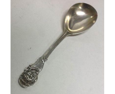 A novelty silver caddy spoon of fluted design. London. By Henry Holland. Approx. 23 grams. Est. £45 - £55.