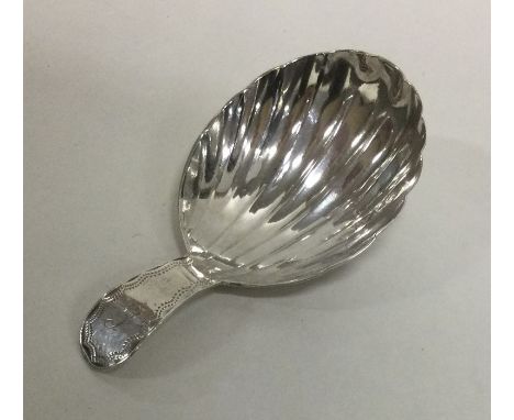 A George III silver caddy spoon. Birmingham 1792. Approx. 6 grams. Est. £40 - £60.