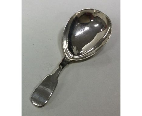 A George II silver caddy spoon. London 1823. By Eley &amp; Fearne. Approx. 4 grams. Est. £30 - £50.