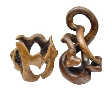Helen Skelton (British 1933 – 2023): Two carved wooden abstract sculptures, one modelled as a entwined knot, largest H48cm. B