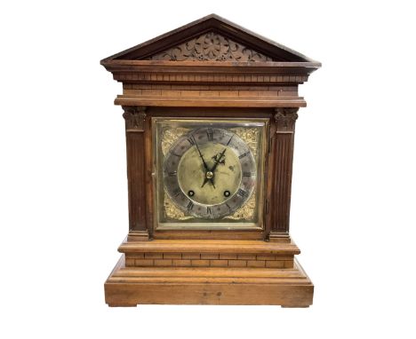 Winterhalder & Hofmeier - late 19th century Mahogany 8-day twin train mantle clock , with an architectural pediment  and carv