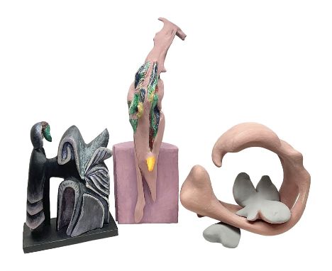 Helen Skelton (British 1933 – 2023): Three carved wooden abstract sculptures, two in pink tones, the third in dark tones, lar