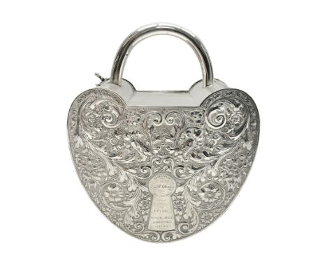 Silver plated, tea caddy, in the form of a heart, with repousse decoration, presented to H Whitcombe, H20cm