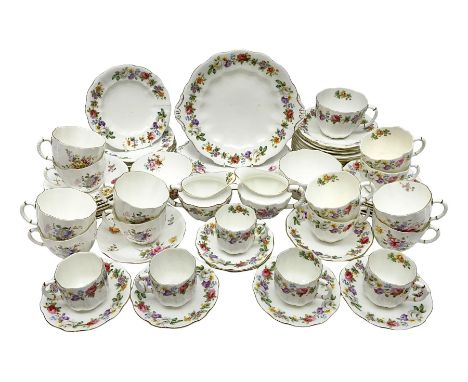 Royal Crown Derby Posies pattern tea service, including two milk jugs, two open sucrier, twelve teacups and saucers, twelve d