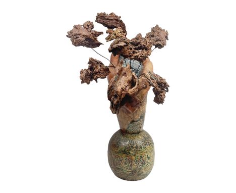 Helen Skelton (British 1933 – 2023): Large carved wooden sculpture, modelled as an abstract vase with wooden flowers, H78cm. 