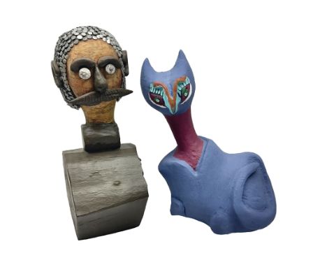 Helen Skelton (British 1933 – 2023): Two carved wooden abstract sculptures, one modelled as a cat, painted in bright colours,