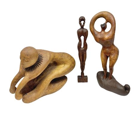 Helen Skelton (British 1933 – 2023): Three carved wooden abstract sculptures, each modelled as a a figure, tallest H52cm. Bor