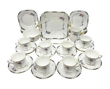 Art deco Shelley tea service for eight, decorated with floral sprigs, comprising teacup and saucers, dessert plates, two cake