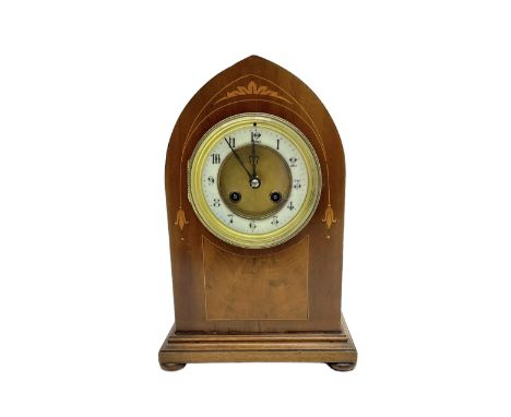 French - mahogany 8-day lancet clock c1910, with an inlaid front raised on a shallow plinth with bun feet, two part dial with