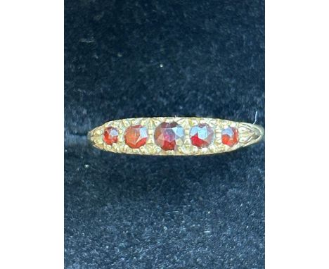 9ct Gold ring set with 5 red stones Size S 1.5g 