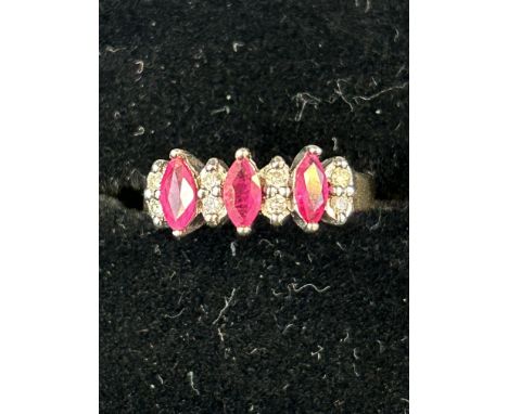 9ct Gold ring set with 0.15 carat diamond &amp; 3 rubies Size O 