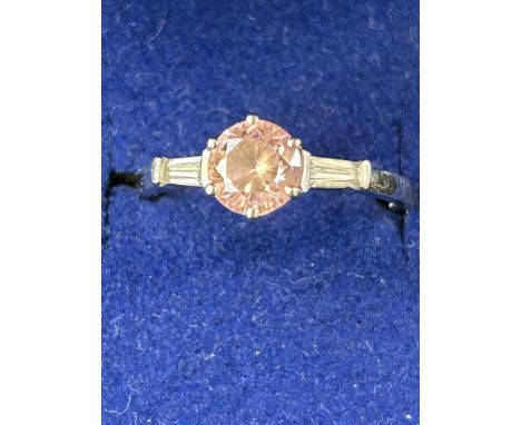 14ct White gold ring set with pink stone 