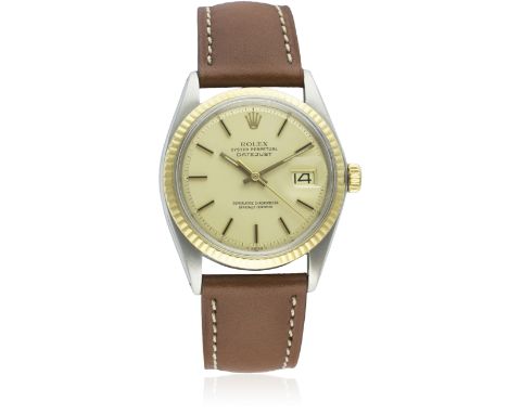 A GENTLEMAN'S STEEL &amp; GOLD ROLEX OYSTER PERPETUAL DATEJUST WRIST WATCH CIRCA 1973, REF. 1601 D: Champagne dial with black