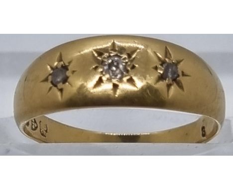 18ct gold and diamond three stone ring.  3g approx.  Size M.  (B.P. 21% + VAT) 