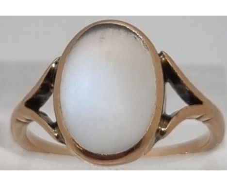 Yellow metal and probably Moonstone ring.  2.4g approx.  Size M1/2.   (B.P. 21% + VAT) 