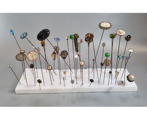 Collection of vintage hatpins, varying designs including: silver enamel butterfly, semi-precious stones, Art Nouveau in the s