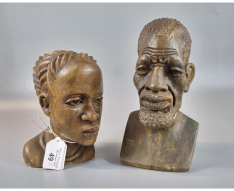 Two African stained composition portrait busts.  20cm high and 15cm high approx.  (2)   (B.P. 21% + VAT) 