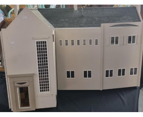Large well made collector's dolls house, taking the form of an Art Deco Charles Rennie Mackintosh design detached residence, 