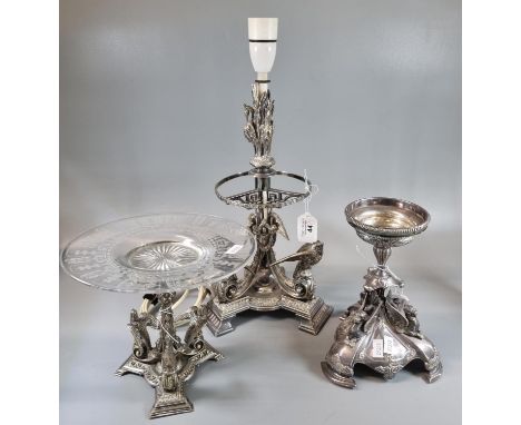 Three silver plated table center pieces, all with animal or bird mounts, one with glass dish top, the other now converted fro